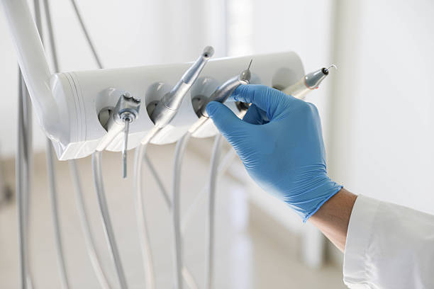 Professional Tooth Extraction technician working in Harper, KS